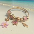 'Treasures of the Tide' Gold stainless steel bracelet.
